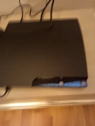 PS3 Slim Sony + Joystick Nero