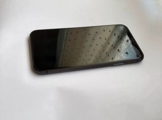 iPhone 11 Negro Version 18.6.2 Salud bateria 75%