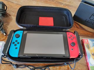 Nintendo Switch con 4 giochi