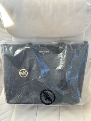 Bolso Michael Kors Jet Set Negro y Dorado