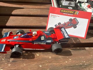 Lote 8 coches Scalextric , con el maletin incluido