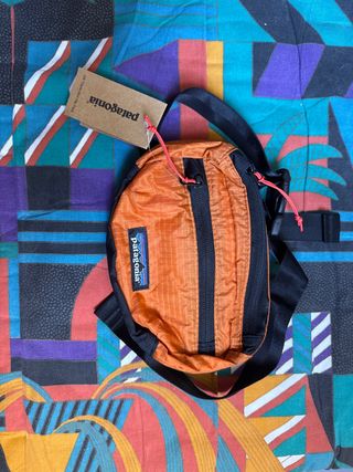 Riñonera Patagonia Naranja y Negra