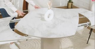 Mesa extensible cerámica + 4 sillas