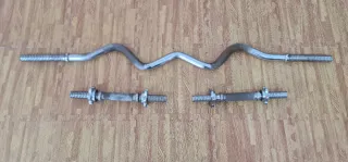 Lote de barras y discos de pesas