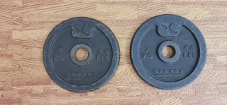 Lote de barras y discos de pesas