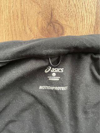 Chaleco Asics running invierno