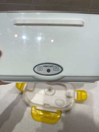 Scaldavivande elettrico giallo e bianco