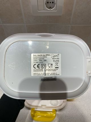 Scaldavivande elettrico giallo e bianco