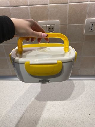 Scaldavivande elettrico giallo e bianco