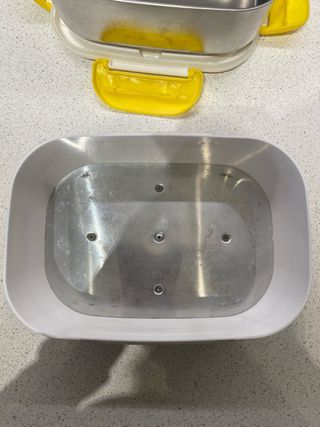 Scaldavivande elettrico giallo e bianco