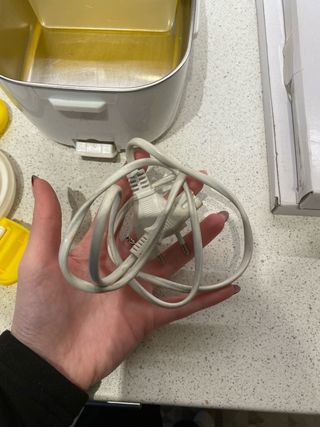 Scaldavivande elettrico giallo e bianco