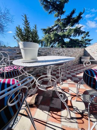 Mesa y 4 sillas hierro forjado