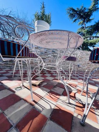 Mesa y 4 sillas hierro forjado