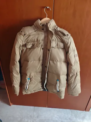 Plumas niño cremallera y capucha desmontable