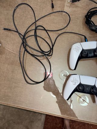 Consola PS5 con 2 mandos y juego