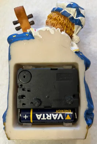 Orologio clown con violino