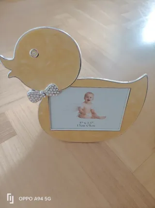 Cornice portafoto a forma di anatra