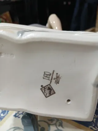 Figura Nao de Lladró niño con periódico