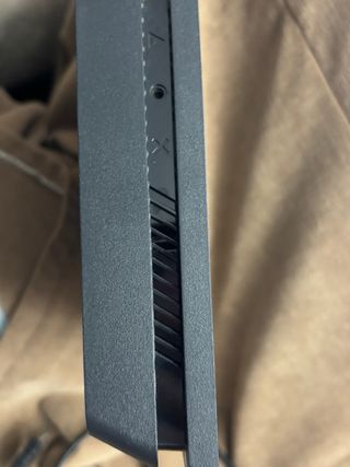 PS4 Negra con mando y auriculares