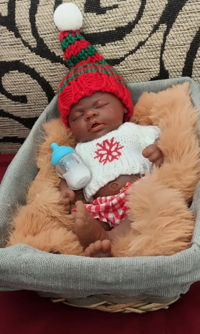 Mini reborn negrito silicona