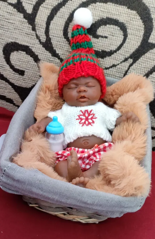 Mini reborn negrito silicona