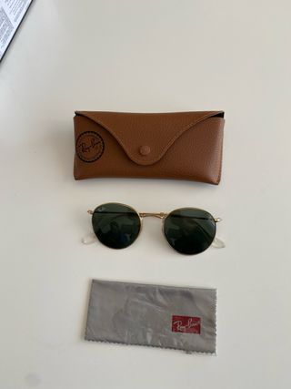 Gafas de sol Ray-Ban doradas y marrones