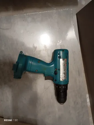 Taladro Makita DC9711 con Batería 9120