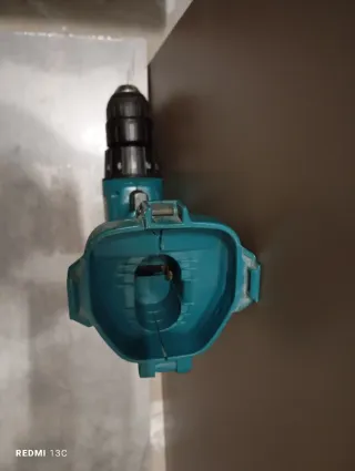 Taladro Makita DC9711 con Batería 9120
