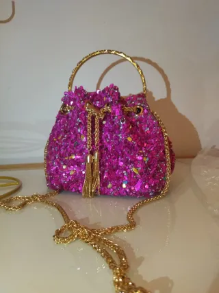 Bolso joya pedrería rosa y dorado