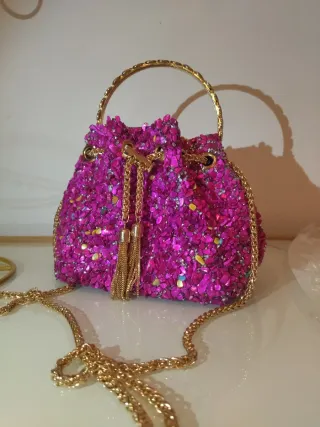 Bolso joya pedrería rosa y dorado