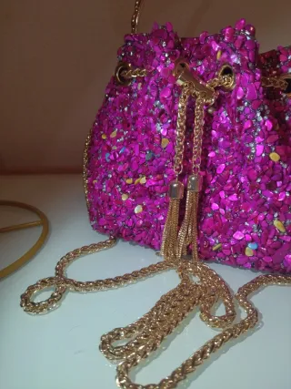 Bolso joya pedrería rosa y dorado