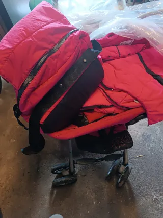 Passeggino rosa con ovetto