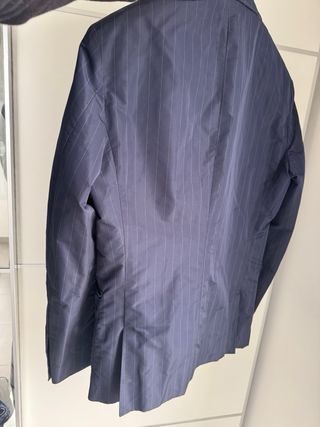 Americana acolchada azul con rayas