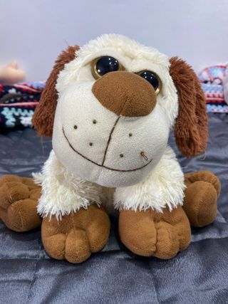 Peluche perro ojos grandes