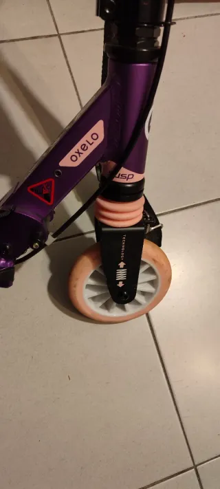 Patinete morado para niños