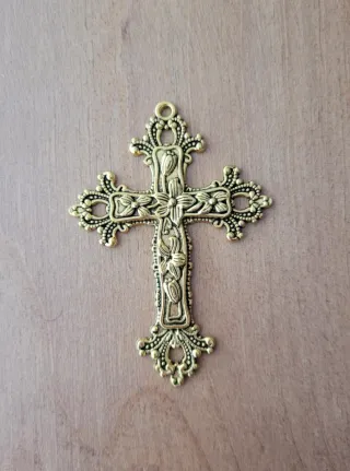 Cruz dorada para aderezos