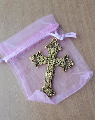 Cruz dorada para aderezos