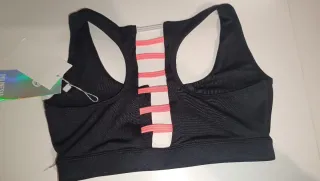 Top deportivo negro y rosa sin estrenar