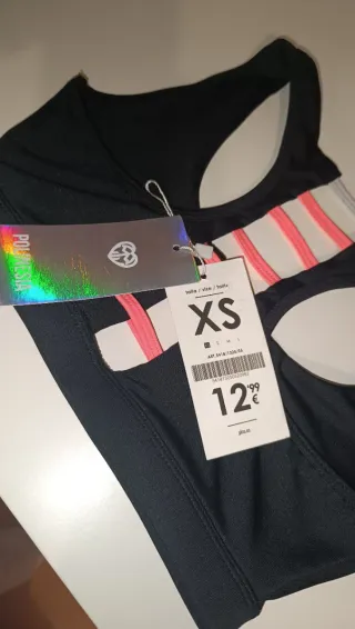 Top deportivo negro y rosa sin estrenar