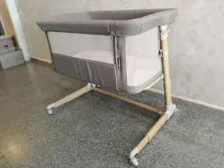 cuna con laterales de malla