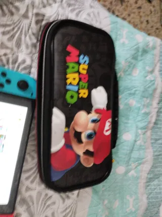 Nintendo Switch Azul con 2 juegos y estuche