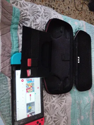 Nintendo Switch Azul con 2 juegos y estuche