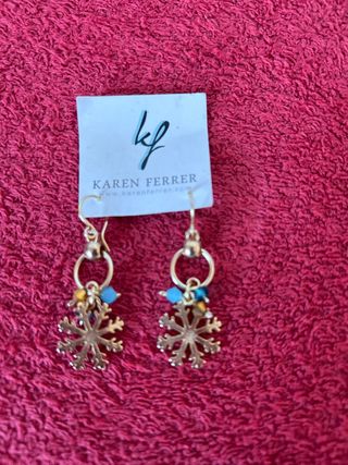 Pendientes largos dorados copo de nieve