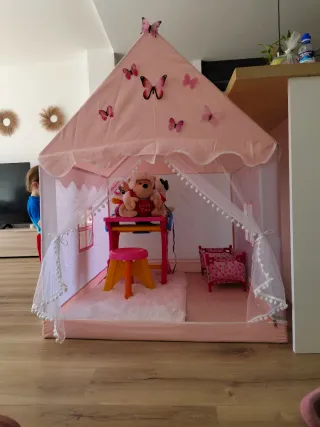 Casa de juegos infantil rosa