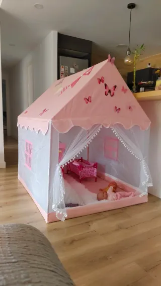 Casa de juegos infantil rosa