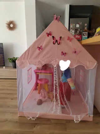 Casa de juegos infantil rosa