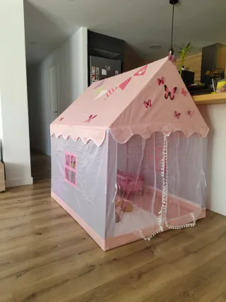 Casa de juegos infantil rosa