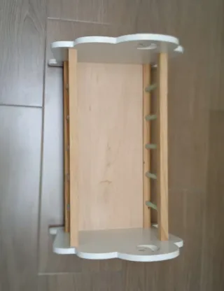 Cuna de juguete para muñecas