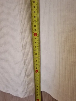 Gonna panna con cintura in tinta