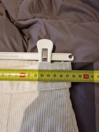 Gonna panna con cintura in tinta